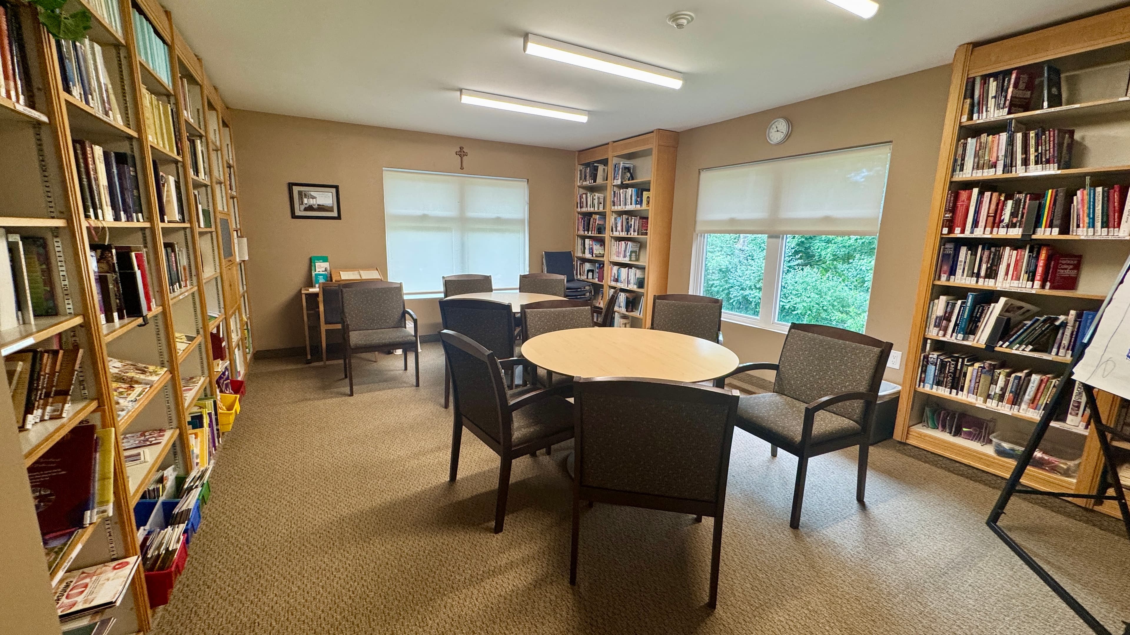 The Parkwood Church library, with bookshelves, tables, and chairs